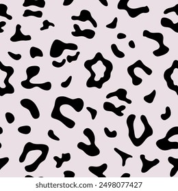 Show leopard skin vector seamless pattern. Abstract panther wild cat animal print repeat pattern background, wallpaper, textile design.