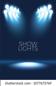 Show lights, empty stage background, blue spotlight