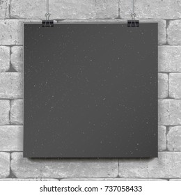 Show your logo, label, brochures, flyers, brochures, headlines etc.Highly detailed realistic design template element.Empty black vector paper mockup hanging with paper clips. On brick wall background