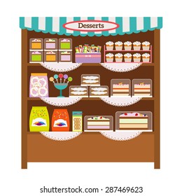 Showcase with desserts. Shop shelves with candy and sweets