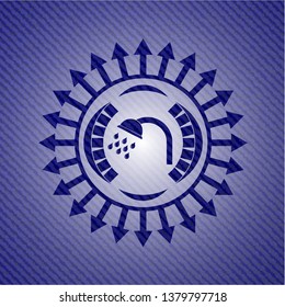 shower icon inside badge with jean texture