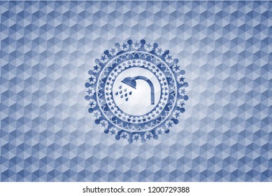 shower icon inside blue emblem with geometric pattern.