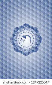 shower icon inside blue emblem with geometric pattern.