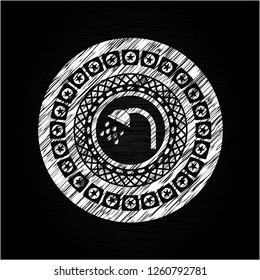 shower icon inside chalkboard emblem on black board