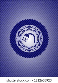 shower icon inside emblem with denim texture