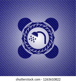 shower icon inside emblem with denim high quality background