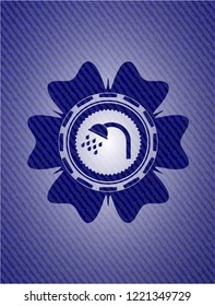 shower icon inside emblem with jean background