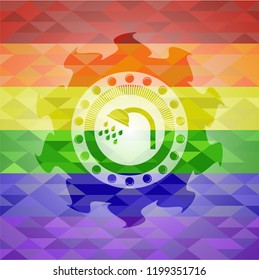 shower icon inside emblem on mosaic background with the colors of the LGBT flag