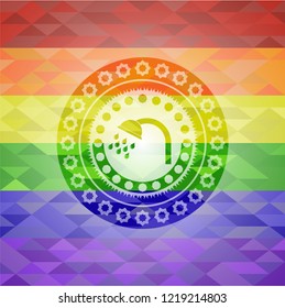 shower icon inside emblem on mosaic background with the colors of the LGBT flag