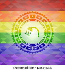 shower icon inside emblem on mosaic background with the colors of the LGBT flag