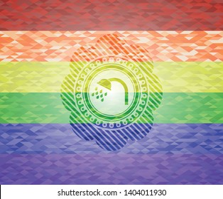 shower icon inside emblem on mosaic background with the colors of the LGBT flag