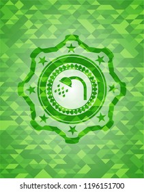 shower icon inside green emblem with mosaic ecological style background