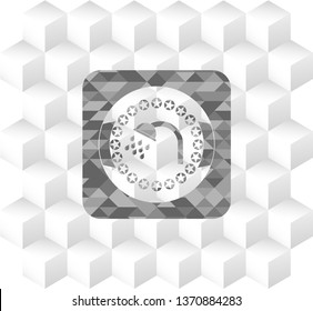 shower icon inside grey badge with geometric cube white background