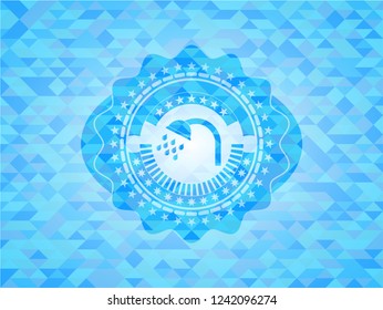 shower icon inside light blue mosaic emblem