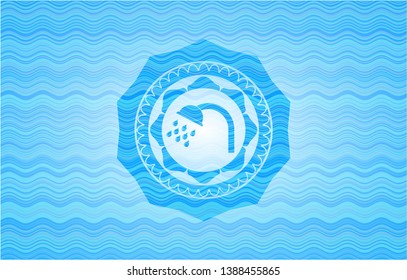 shower icon inside light blue water style emblem.