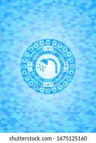 shower icon inside light blue mosaic emblem