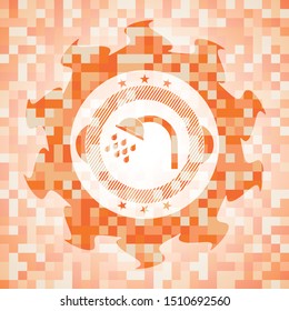 shower icon inside orange mosaic emblem