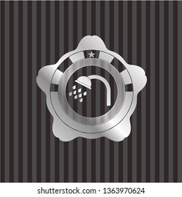 shower icon inside silver shiny emblem
