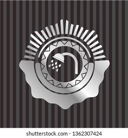 shower icon inside silvery emblem or badge