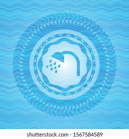 shower icon inside sky blue water wave badge background.