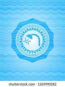 shower icon inside water concept emblem.