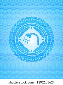 shower icon inside water representation badge.