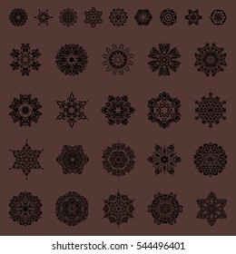 Showflakes icon collection. Set of twenty nine snowflakes and dots on a brown background. Vector falling snow set. Starry Sky.