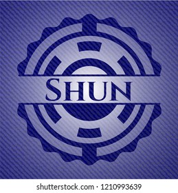 Shun emblem with jean background