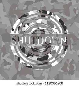 Shutdown on grey camouflaged texture