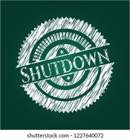 Shutdown written on a blackboard