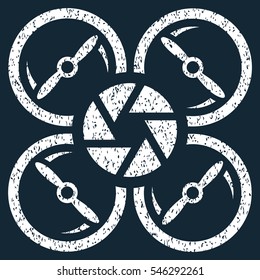 Shutter Drone grainy textured icon for overlay watermark stamps. Flat symbol with scratched texture. Dotted vector white ink rubber seal stamp with grunge design on a dark blue background.