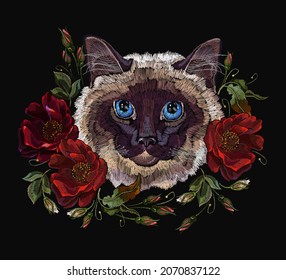 Siamese cat and ring from red roses flowers. Beautiful kitty and and floral garden. Classical embroidery in black background. Fashionable romantic template for clothes, t-shirt design 