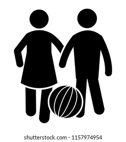 
Siblings are standing with the ball on floor depicting vacation sports and ball activity 
