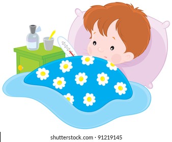 sick boy lying with a thermometer in a bed