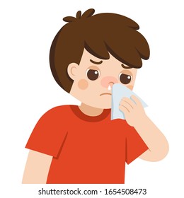 Sick cute boy with a cold and runny nose getting paper napkin sneezing,  Flu symptoms.