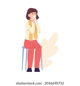 Sick woman blowing her nose on tissue - cartoon girl with flu or cold symptoms sitting on chair and holding napkin. Flat isolated vector illustration of ill person with handkerchief.