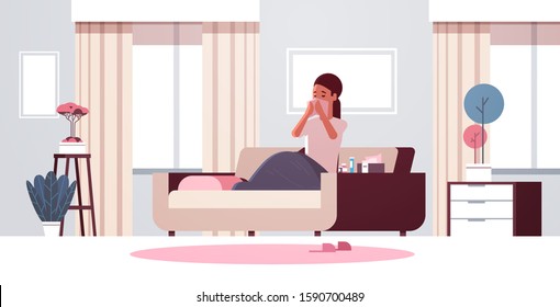 sick woman blowing nose with handkerchief unhealthy girl having flu sneeze sitting on sofa under blanket illness concept modern living room interior flat full length horizontal vector illustration