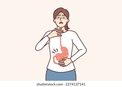 Sick woman with symptoms of gastroesophageal reflux or gastritis disease resulting from junk food. Girl suffers from gastritis and violation of digestive processes surviving nausea