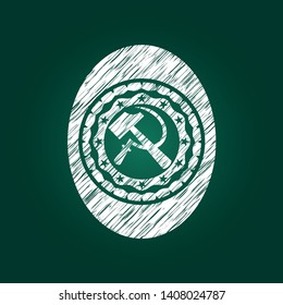 sickle and hammer icon with chalkboard texture