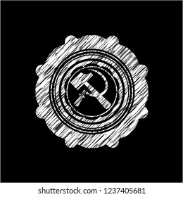 sickle and hammer icon drawn on a blackboard