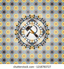 sickle and hammer icon inside arabesque badge background. arabic decoration.