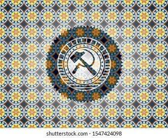 sickle and hammer icon inside arabesque badge background. arabic decoration.