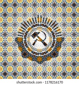 sickle and hammer icon inside arabic emblem. Arabesque decoration.