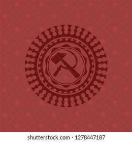 sickle and hammer icon inside badge with red background