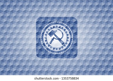 sickle and hammer icon inside blue polygonal emblem.