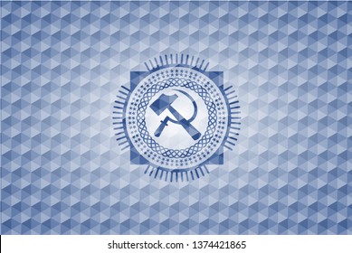 sickle and hammer icon inside blue polygonal emblem.
