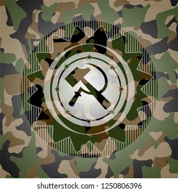 sickle and hammer icon inside camo emblem