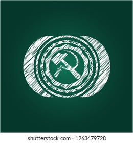 sickle and hammer icon inside chalkboard emblem