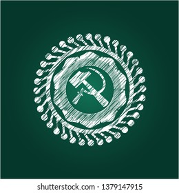 sickle and hammer icon inside chalkboard emblem