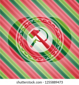 sickle and hammer icon inside christmas emblem.
